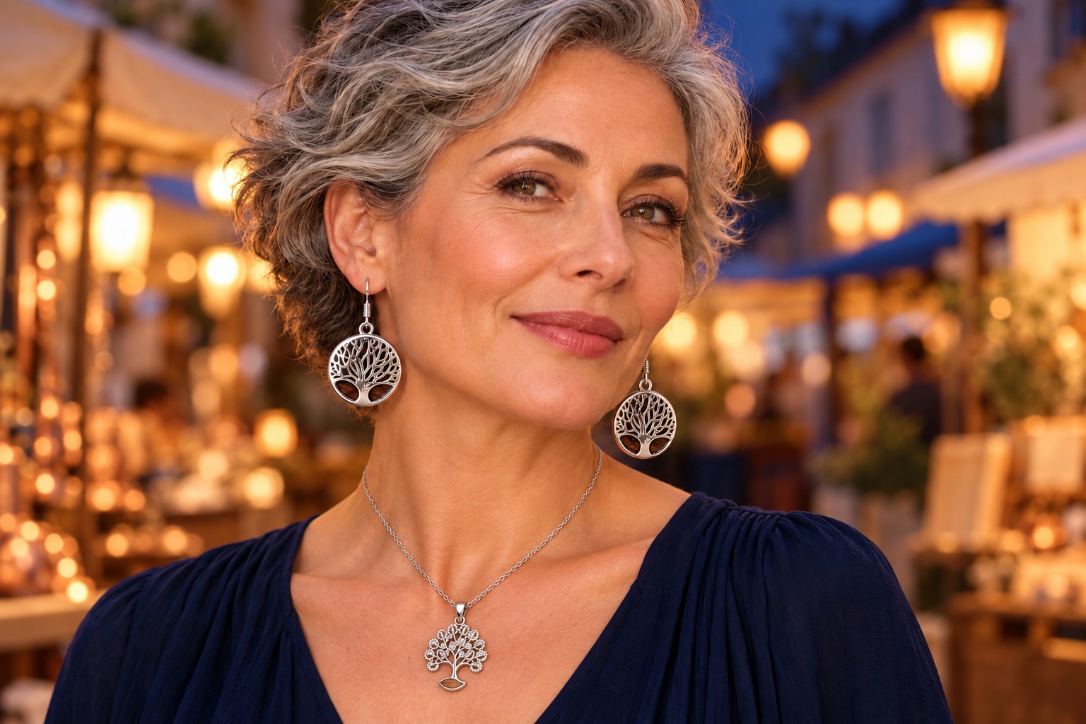 Woman wearing BI 19 Tree of Life earrings and the BI 35 delicate tree necklace